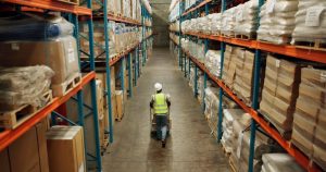 warehouse-worker-walking-among-inventory