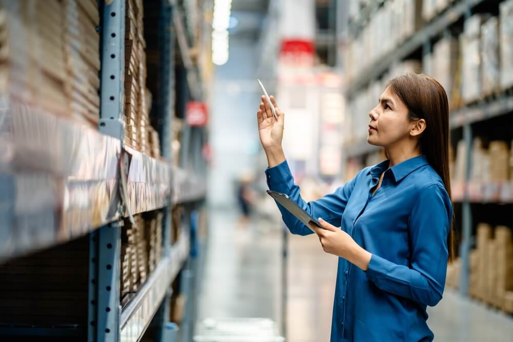 woman-warehouse-staff-checking-stock-inventory